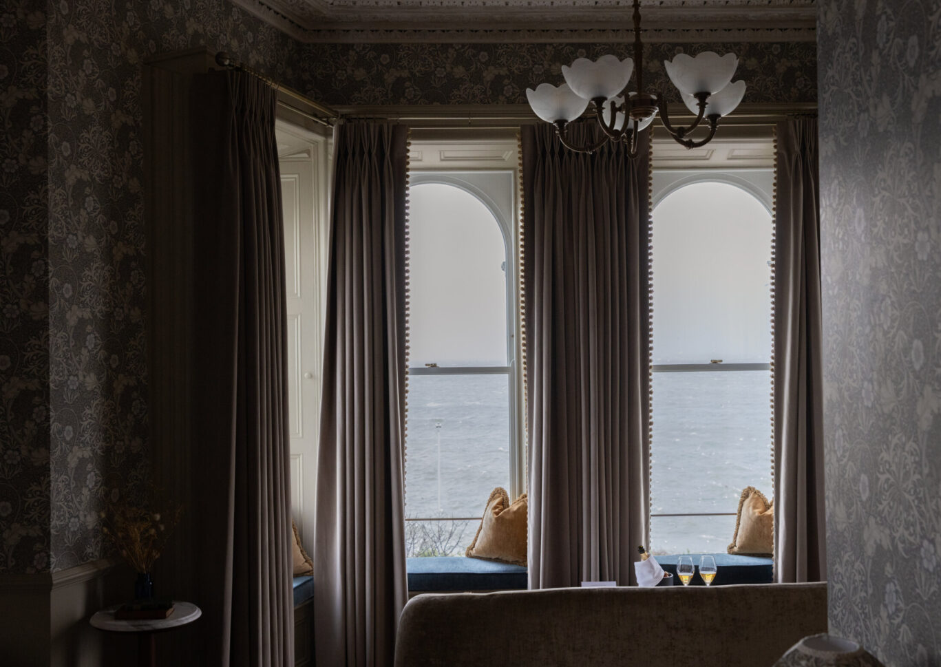 Sea view through tall vertical windows at Haddington House Hotel, Dún Laoghaire